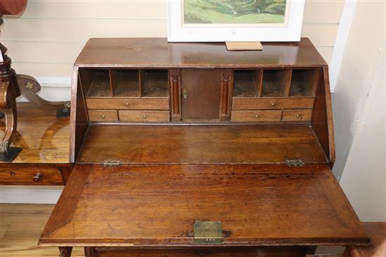 A George III oak bureau W.92cm